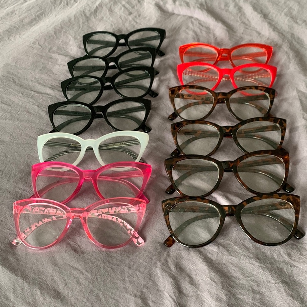 13 pair of Betsy Johnson, Cat Eye reading glasses. Various colors, as shown.